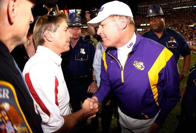 BATON ROUGE, LA - NOVEMBER 08:  Head Coach Nick Saban of the Alabama Crimson Tide is congratulated by head coach Les Miles of the Louisiana State University Tigers after the Tide defeated the Tigers 27-21 in overtime on November 11, 2008 at Tiger Stadium in Baton Rouge, Louisiana.  (Photo by Chris Graythen/Getty Images)