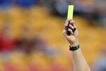 BRISBANE, AUSTRALIA - AUGUST 31:  Referee Peter O'Leary hands out a yellow card to Michael Jedinak of the Mariners during the round three A-League match between the Queensland Roar and the Central Coast Mariners held at Suncorp Stadium on August 31, 2008 in Brisbane, Australia.  (Photo by Bradley Kanaris/Getty Images)