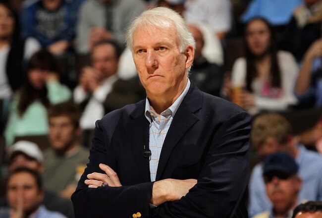 DENVER, CO - MARCH 23:  Head coach Gregg Popovich of the San Antonio Spurs looks on as he leads his team against the Denver Nuggets at the Pepsi Center on March 23, 2011 in Denver, Colorado. The Nuggets defeated the Spurs 115-112. NOTE TO USER: User expressly acknowledges and agrees that, by downloading and or using this photograph, User is consenting to the terms and conditions of the Getty Images License Agreement.  (Photo by Doug Pensinger/Getty Images)