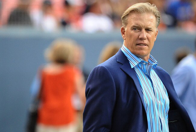 DENVER, CO - AUGUST 27: Executive Vice President of Football Operations John Elway for the Denver Broncos watches the preseason game at Sports Authority Field at Mile High on August 27, 2011 in Denver, Colorado.  (Photo by Garrett W. Ellwood/Getty Images)