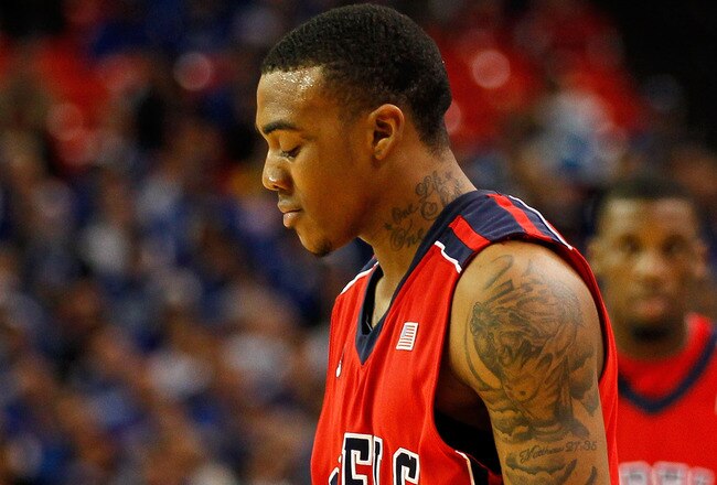 ATLANTA, GA - MARCH 11:  Dundrecous Nelson #5 of the Ole Miss Rebels reacts during their game against the Kentucky Wildcats in the quarterfinals of the SEC Men's Basketball Tournament at Georgia Dome on March 11, 2011 in Atlanta, Georgia.  (Photo by Kevin C. Cox/Getty Images)