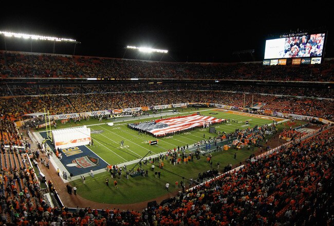 MIAMI GARDENS, FL - JANUARY 04:  A general view of an American Flag stretched across the field for the performance of the National Anthem prior to the West Virginia Mountaineers taking on the Clemson TIgersduring the Discover Orange Bowl at Sun Life Stadium on January 4, 2012 in Miami Gardens, Florida.  (Photo by J. Meric/Getty Images)