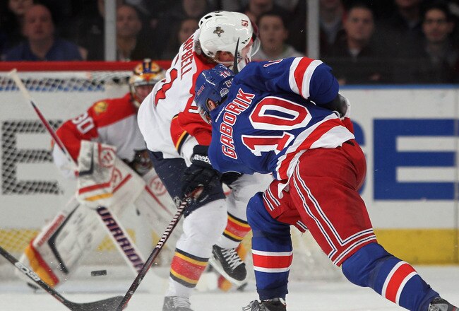 NEW YORK, NY - JANUARY 05:  Marian Gaborik #10 of the New York Rangers scores his game winning goal at 3:21 of overtime against the Florida Panthers at Madison Square Garden on January 5, 2012 in New York City. The Rangers defeated the Panthers 3-2 in overtime.  (Photo by Bruce Bennett/Getty Images)