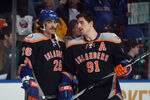 UNIONDALE, NY - NOVEMBER 23: Matt Moulson #26 and John Tavares #91 of the New York Islanders skate in warmups prior to the game against the Philadelphia Flyers at the Nassau Veterans Memorial Coliseum on November 23, 2011 in Uniondale, New York.  (Photo by Bruce Bennett/Getty Images)