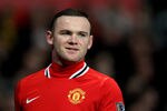 MANCHESTER, ENGLAND - DECEMBER 26:  Wayne Rooney of Manchester United looks on during the Barclays Premier League match between Manchester United and Wigan Athletic at Old Trafford on December 26, 2011 in Manchester, England.  (Photo by Alex Livesey/Getty Images)