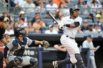 NEW YORK, NY - AUGUST 13: Curtis Granderson #14 of the New York Yankees watches his solo home run to lead off the bottom of the fifth inning against the Tampa Bay Rays at Yankee Stadium on August 13, 2011 in the Bronx borough of New York City. (Photo by Christopher Pasatieri/Getty Images)