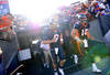 DENVER, CO - DECEMBER 18: Quarterbacks Tim Tebow #15 and Brady Quinn #9 of the Denver Broncos take the field during warm ups before playing the New England Patriots at Sports Authority Field at Mile High on December 18, 2011 in Denver, Colorado. (Photo by Patrick Smith/Getty Images)
