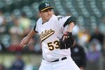 OAKLAND, CA - JULY 27:  Trevor Cahill #53 of the Oakland Athletics pitches against the Tampa Bay Rays at O.co Coliseum on July 27, 2011 in Oakland, California.  (Photo by Jed Jacobsohn/Getty Images)