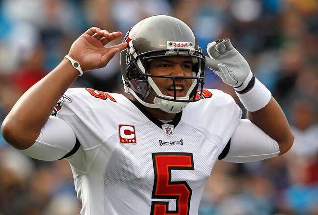 CHARLOTTE, NC - DECEMBER 24:  Josh Freeman #5 of the Tampa Bay Buccaneers calls a play during their game against the Carolina Panthers at Bank of America Stadium on December 24, 2011 in Charlotte, North Carolina.  (Photo by Streeter Lecka/Getty Images)