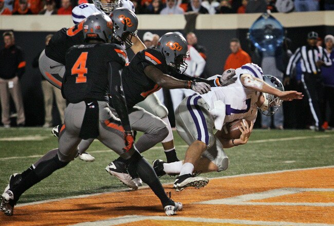 STILLWATER, OK - NOVEMBER 5:  Quarterback Collin Klein #7 of the Kansas State Wildcats scores in the second half against the Oklahoma State Cowboys on November 5, 2011 at Boone Pickens Stadium in Stillwater, Oklahoma.  Oklahoma State defeated Kansas State 52-45.  (Photo by Brett Deering/Getty Images)