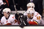BOSTON, MA - JANUARY 05:  Jarome Iginla #12 and Paul Byron #32 of the Calgary Flames sit on the bench in the third period against the Boston Bruins on January 5, 2012 at TD Garden in Boston, Massachusetts. The Boston Bruins defeated the Calgary Flames 9-0.  (Photo by Elsa/Getty Images)