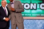 NEWARK, NJ - JUNE 23:  Marshon Brooks from Providence greets NBA Commissioner David Stern after Brooks was drafted #25 overall by the Boston Celtics in the first round during the 2011 NBA Draft at the Prudential Center on June 23, 2011 in Newark, New Jersey. Brooks was then traded to the New Jersey Nets in a draft night trade. NOTE TO USER: User expressly acknowledges and agrees that, by downloading and/or using this Photograph, user is consenting to the terms and conditions of the Getty Images License Agreement.  (Photo by Mike Stobe/Getty Images)