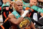 LAS VEGAS, NV - SEPTEMBER 17:  Floyd Mayweather Jr. celebrates his fourth-round knockout of Victor Ortiz to win the WBC welterweight title September 17, 2011 in Las Vegas, Nevada.  (Photo by Ethan Miller/Getty Images)