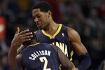 BOSTON, MA - JANUARY 06:  Danny Granger #33 of the Indiana Pacers congratulates Darren Collison #2 after Collison shot a 3-point shot late in the fourth quarter against the Boston Celtics on January 6, 2012 at TD Garden in Boston, Massachusetts. The Indiana Pacers defeated the Boston Celtics 87-74. NOTE TO USER: User expressly acknowledges and agrees that, by downloading and or using this photograph, User is consenting to the terms and conditions of the Getty Images License Agreement.  (Photo by Elsa/Getty Images)