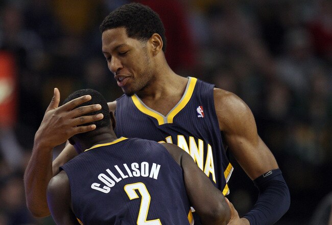 BOSTON, MA - JANUARY 06:  Danny Granger #33 of the Indiana Pacers congratulates Darren Collison #2 after Collison shot a 3-point shot late in the fourth quarter against the Boston Celtics on January 6, 2012 at TD Garden in Boston, Massachusetts. The Indiana Pacers defeated the Boston Celtics 87-74. NOTE TO USER: User expressly acknowledges and agrees that, by downloading and or using this photograph, User is consenting to the terms and conditions of the Getty Images License Agreement.  (Photo by Elsa/Getty Images)