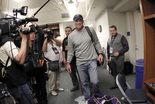 DETROIT, MI - JANUARY 02:  Brett Favre #4 of the Minnesota Vikings heads to a post game press conference after a 13-20 loss to the Detroit Lions at Ford Field on January 2, 2011 in Detroit, Michigan.  (Photo by Gregory Shamus/Getty Images)