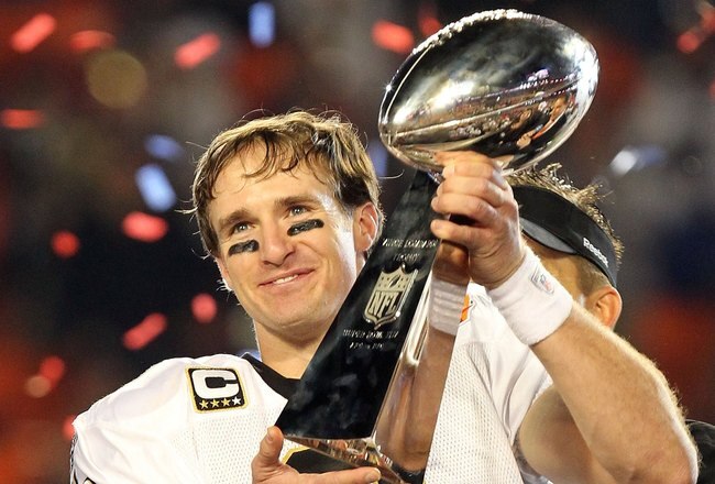 MIAMI GARDENS, FL - FEBRUARY 07:  Quarterback Drew Brees #9 of the New Orleans Saints celebrates after his team defeated the Indianapolis Colts during Super Bowl XLIV on February 7, 2010 at Sun Life Stadium in Miami Gardens, Florida.  (Photo by Ronald Martinez/Getty Images)