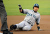 OAKLAND, CA - SEPTEMBER 02: Ichiro Suzuki #51 of the Seattle Mariners hits a single and slides into third on a two base error by Michael Taylor #23 of the Oakland Athletics in the first inning during an MLB baseball game at O.co Coliseum on September 2, 2011 in Oakland, California.  (Photo by Thearon W. Henderson/Getty Images)