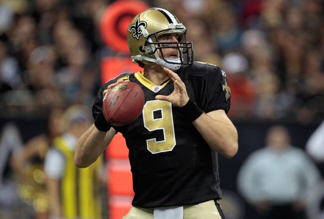 NEW ORLEANS, LA - JANUARY 01:   Drew Brees #9 of the New Orleans Saints looks to throw a pass during the game against the Carolina Panthers at the Mercedes-Benz Superdome on January 1, 2012 in New Orleans, Louisiana.  (Photo by Chris Graythen/Getty Images)