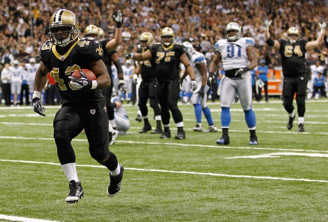 NEW ORLEANS, LA - DECEMBER 04:  Running back Darren Sproles #43 of the New Orleans Saints scores a touchdown against the Detroit Lions in the fourth quarter at Mercedes-Benz Superdome on December 4, 2011 in New Orleans, Louisiana.  (Photo by Chris Graythen/Getty Images)