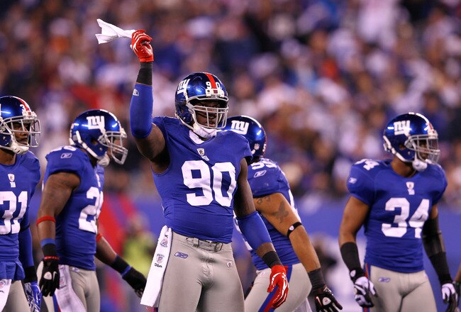 EAST RUTHERFORD, NJ - JANUARY 01:  Jason Pierre-Paul #90 of the New York Giants reacts while playing against the Dallas Cowboys at MetLife Stadium on January 1, 2012 in East Rutherford, New Jersey.  (Photo by Al Bello/Getty Images)