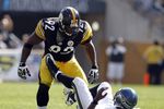 PITTSBURGH, PA - SEPTEMBER 18:   James Harrison #92 of the Pittsburgh Steelers reacts to sacking Tarvaris Jackson #7 of the Seattle Seahawks during the game on September 18, 2011 at Heinz Field in Pittsburgh, Pennsylvania.  The Steelers defeated the Seahawks 24-0.  (Photo by Justin K. Aller/Getty Images)