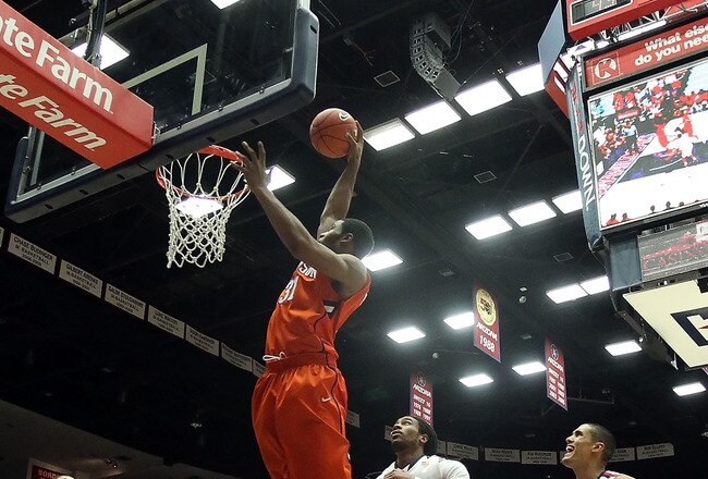 TUCSON, AZ - DECEMBER 10:  Devin Booker #31 of the Clemson Tigers slam dunks the ball against the Arizona Wildcats during the college basketball game at McKale Center on December 10, 2011 in Tucson, Arizona. The Wildcats defeated the Tigers 63-47.  (Photo by Christian Petersen/Getty Images)