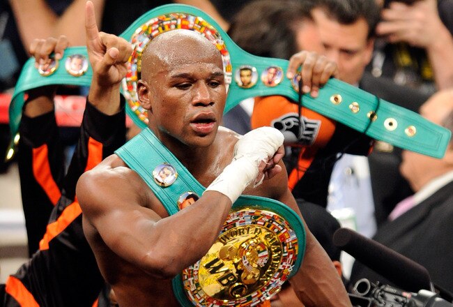 LAS VEGAS, NV - SEPTEMBER 17:  Floyd Mayweather Jr. celebrates his fourth-round knockout of Victor Ortiz to win the WBC welterweight title September 17, 2011 in Las Vegas, Nevada.  (Photo by Ethan Miller/Getty Images)