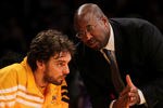 LOS ANGELES, CA - JANUARY 06:  Head coach Mike Brown of the Los Angeles Lakers confers with Pau Gasol #16 before the game with the Golden State Warriors at Staples Center on January 6, 2012 in Los Angeles, California.  The Lakers won 97-90. NOTE TO USER: User expressly acknowledges and agrees that, by downloading and or using this photograph, User is consenting to the terms and conditions of the Getty Images License Agreement.  (Photo by Stephen Dunn/Getty Images)