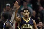 BOSTON, MA - JANUARY 06: Danny Granger #33 of the Indiana Pacers is congratulated by teammate Darren Collison #3 after Granger drew the foul in the second half against the Boston Celtics on January 6, 2012 at TD Garden in Boston, Massachusetts. The Indiana Pacers defeated the Boston Celtics 87-74. NOTE TO USER: User expressly acknowledges and agrees that, by downloading and or using this photograph, User is consenting to the terms and conditions of the Getty Images License Agreement.  (Photo by Elsa/Getty Images)