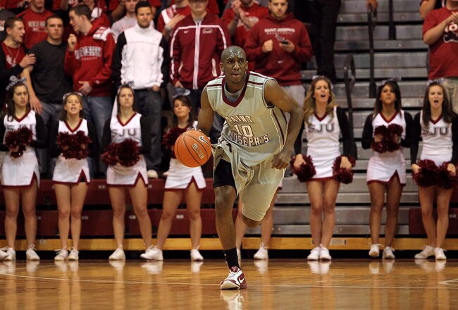 PHILADELPHIA, PA - DECEMBER 08:  Langston Galloway #10 of the St. Joseph's Hawks brings the ball up court against the Minnesota Golden Gophers at Michael J. Hagan Arena on December 8, 2010 in Philadelphia, Pennsylvania.  (Photo by Chris Chambers/Getty Images)