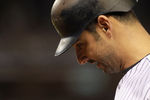 NEW YORK, NY - OCTOBER 06:  Jorge Posada #20 of the New York Yankees walks back to the dugout with his head down after he grounded out in the bottom of the eighth inning against the Detroit Tigers during Game Five of the American League Championship Series at Yankee Stadium on October 6, 2011 in the Bronx borough of New York City.  (Photo by Nick Laham/Getty Images)