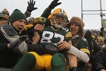 GREEN BAY, WI - JANUARY 01: Jordy Nelson #87 of the Green Bay Packers leaps into the stands after scoring a touchdown against the Detroit Lions at Lambeau Field on January 1, 2012 in Green Bay, Wisconsin. (Photo by Jonathan Daniel/Getty Images)