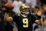 NEW ORLEANS, LA - JANUARY 07:  Drew Brees #9 of the New Orleans Saints drops back to pass against the Detroit Lions during their 2012 NFC Wild Card Playoff game at Mercedes-Benz Superdome on January 7, 2012 in New Orleans, Louisiana.  (Photo by Chris Graythen/Getty Images)