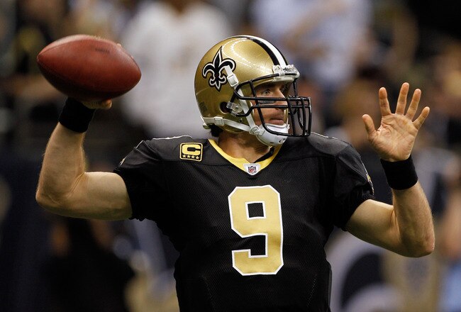 NEW ORLEANS, LA - JANUARY 07:  Drew Brees #9 of the New Orleans Saints drops back to pass against the Detroit Lions during their 2012 NFC Wild Card Playoff game at Mercedes-Benz Superdome on January 7, 2012 in New Orleans, Louisiana.  (Photo by Chris Graythen/Getty Images)