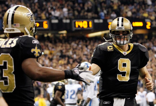 NEW ORLEANS, LA - JANUARY 07:  Drew Brees #9 of the New Orleans Saints celebrates with  Darren Sproles #43 after Sproles' touchdown in the second quarter against the Detroit Lions during their 2012 NFC Wild Card Playoff game at Mercedes-Benz Superdome on January 7, 2012 in New Orleans, Louisiana.  (Photo by Kevin C. Cox/Getty Images)
