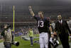 HOUSTON, TX - JANUARY 7: Quarterback T.J. Yates #13 of the Houston Texans raises his arm as he leaves the field after the Houston Texans defeated the Cincinnati Bengals in the 2012 AFC Wild Card Playoff game at Reliant Stadium on January 7, 2012 in Houston, Texas.The Texans defeated the Bengals 31-10.  (Photo by Thomas B. Shea/Getty Images)