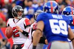 EAST RUTHERFORD, NJ - JANUARY 08:  Matt Ryan #2 of the Atlanta Falcons looks to pass against the New York Giants during their NFC Wild Card Playoff game at MetLife Stadium on January 8, 2012 in East Rutherford, New Jersey.  (Photo by Chris Trotman/Getty Images)