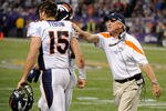 MINNEAPOLIS, MN - DECEMBER 4: John Fox, head coach of the Denver Broncos congratulates Tim Tebow #15 on a two point conversion against the Minnesota Vikings in the fourth quarter on December 4, 2011 at Mall of America Field at the Hubert H. Humphrey Metrodome in Minneapolis, Minnesota. The Broncos defeated the Vikings 35-32. (Photo by Hannah Foslien/Getty Images)