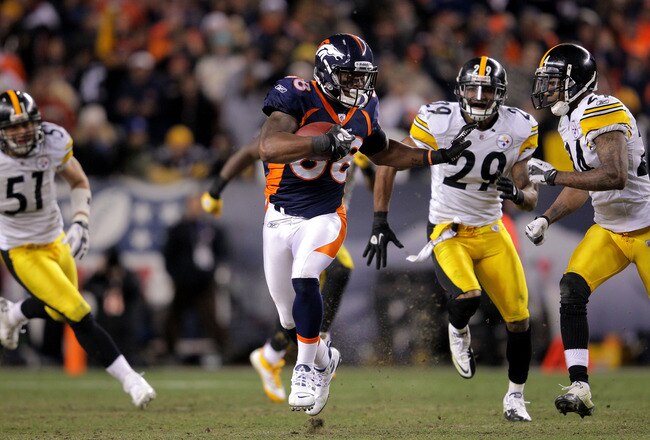 DENVER, CO - JANUARY 08:  Demaryius Thomas #88 of the Denver Broncos stiff arms Ike Taylor #24 of the Pittsburgh Steelers to score an 80 yard touchdown in overtime during the AFC Wild Card Playoff game at Sports Authority Field at Mile High on January 8, 2012 in Denver, Colorado. The Denver Broncos defeated the the Pittsburgh Steelers in over time 23 - 29.  (Photo by Doug Pensinger/Getty Images)