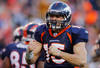 DENVER, CO - JANUARY 08:  Tim Tebow #15 of the Denver Broncos celebrates after running the ball in the end zone for a touchdown in the second quarter against the Pittsburgh Steelers during the AFC Wild Card Playoff game at Sports Authority Field at Mile High on January 8, 2012 in Denver, Colorado.  (Photo by Doug Pensinger/Getty Images)