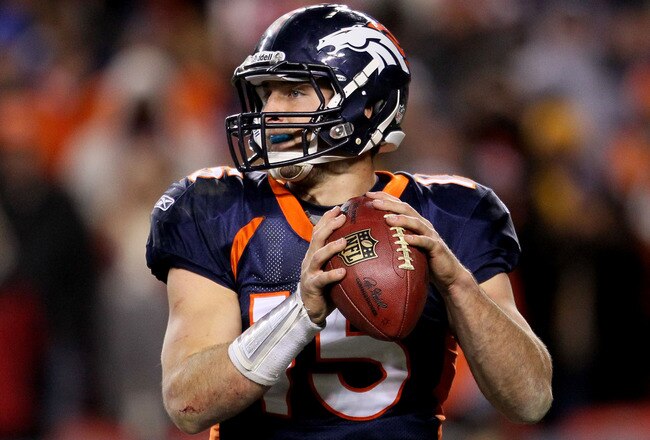 DENVER, CO - JANUARY 08:  Tim Tebow #15 of the Denver Broncos looks to pass against the Pittsburgh Steelers during the AFC Wild Card Playoff game at Sports Authority Field at Mile High on January 8, 2012 in Denver, Colorado.  (Photo by Jeff Gross/Getty Images)