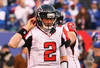 EAST RUTHERFORD, NJ - JANUARY 08:  Matt Ryan #2 of the Atlanta Falcons walks towards the sideline in the fourth quarter against the New York Giants  during their NFC Wild Card Playoff game at MetLife Stadium on January 8, 2012 in East Rutherford, New Jersey.  (Photo by Al Bello/Getty Images)
