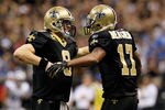 NEW ORLEANS, LA - JANUARY 07:  Drew Brees #9 and  Robert Meachem #17 of the New Orleans Saints celebrate after their touchdown in the fourth quarter against the Detroit Lions during their 2012 NFC Wild Card Playoff game at Mercedes-Benz Superdome on January 7, 2012 in New Orleans, Louisiana.  (Photo by Kevin C. Cox/Getty Images)