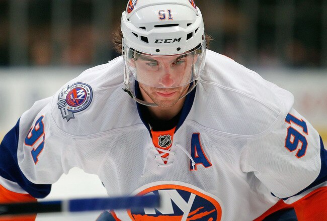 NEW YORK, NY - DECEMBER 26:  John Tavares #91 of the New York Islanders waits for a faceoff in an NHL hockey game against the New York Rangers at Madison Square Garden on December 26, 2011 in New York City.  (Photo by Paul Bereswill/Getty Images)