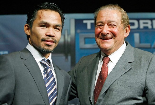LAS VEGAS - DECEMBER 06:  Manny Pacquiao of the Philippines (L) and boxing promoter Bob Arum appear at a news conference following Pacquiao's victory over Oscar De La Hoya in their welterweight bout at the MGM Grand Garden Arena on December 6, 2008 in Las Vegas, Nevada.  (Photo by Ethan Miller/Getty Images)
