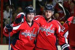 WASHINGTON DC, DC - SEPTEMBER 23:  Nicklas Backstrom #19 (L) of the Washington Capitals celebrates his goal against the Chicago Blackhawks with teammate Mike Green #52 during their preseason game on September 23, 2009 at the Verizon Center in Washington, DC.  (Photo by Jim McIsaac/Getty Images)