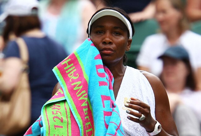 LONDON, ENGLAND - JUNE 27:  Venus Williams of the United States takes a break during her fourth round match against Tsvetana Pironkova of Bulgaria on Day Seven of the Wimbledon Lawn Tennis Championships at the All England Lawn Tennis and Croquet Club on June 27, 2011 in London, England.  (Photo by Clive Brunskill/Getty Images)