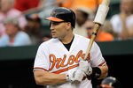 BALTIMORE, MD - JULY 22:  Luke Scott #30 of the Baltimore Orioles waits to bat against the Los Angeles Angels of Anaheim at Oriole Park at Camden Yards on July 22, 2011 in Baltimore, Maryland.  (Photo by Rob Carr/Getty Images)