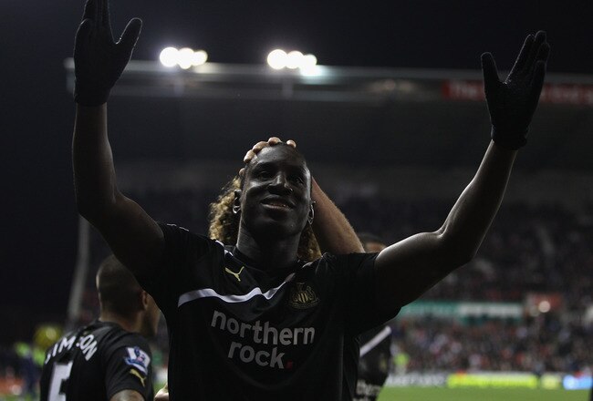 STOKE ON TRENT, ENGLAND - OCTOBER 31:  Demba Ba of Newcastle United celebrates scoring his third goal during the Barclays Premier League match between Stoke City and Newcastle United at the Britannia Stadium on October 31, 2011 in Stoke on Trent, England.  (Photo by Michael Steele/Getty Images)